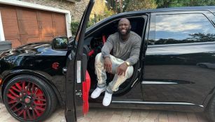 Leonard Fournette junto a su camioneta 