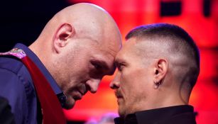 Tyson Fury y Oleksandr Usyk se 'amenazan' en evento de promoción de su pelea