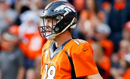 Peyton Manning rompe récord, pero termina en la banca 