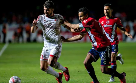 Con diez, Xolos rescata empate contra Veracruz