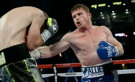 Canelo se impone a Smith y obtiene cinturón Superwelter