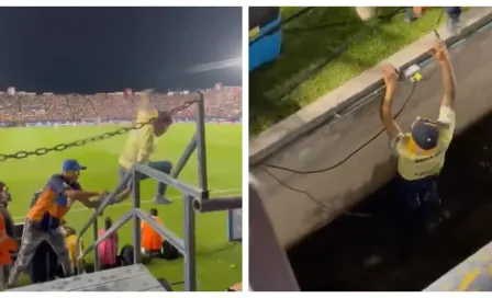 Aficionado del América intenta invadir la cancha, termina mal, se cae en fosa y acaba empapado