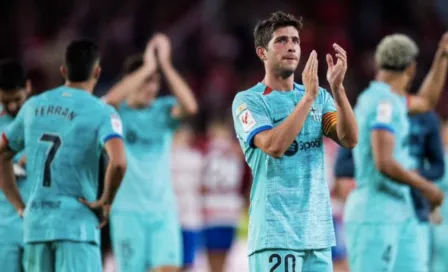 Barcelona empata en su visita a Granada y se aleja del Real Madrid