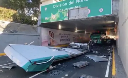 Camión de turistas 'atorado' en el Viaducto, deja 14 heridos 