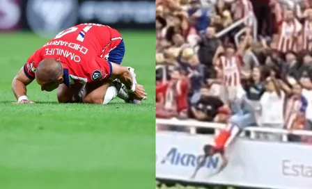 Aficionado de Chivas imita al ‘Chicharito’ y se avienta clavado de la grada a la cancha del Akron