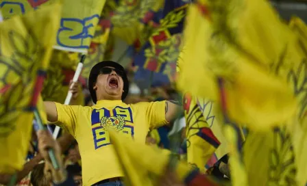 Aficionados de América celebran pase a la Final del Apertura en el Ángel