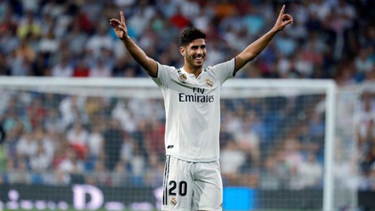 Asensio celebra una victoria del Real Madrid 