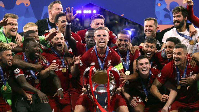 Jordan Henderson levanta el trofeo en festejo por título de la Champions