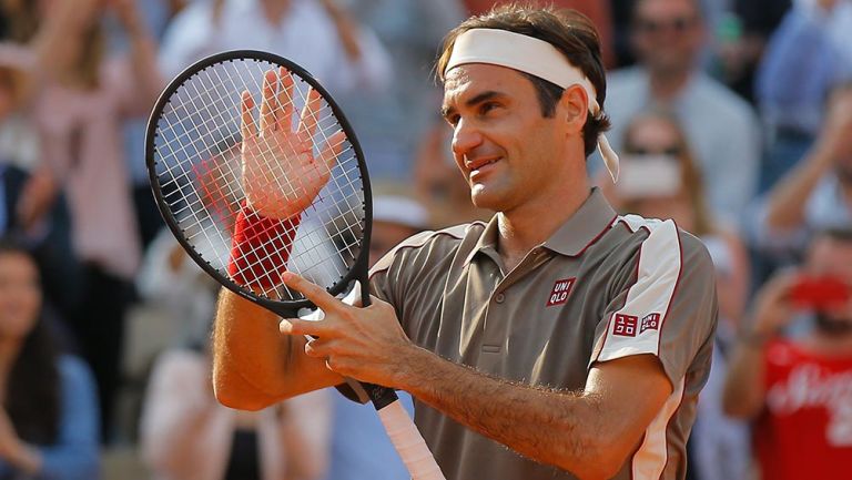 Roger Federer celebra su triunfo contra Stan Wawrinka