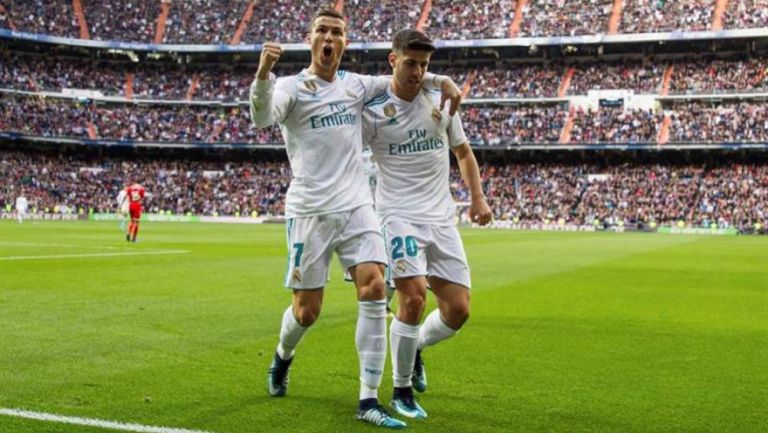 Cristiano Ronaldo celebra un gol con Marco Asensio 