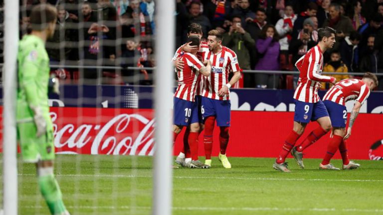 Jugadores del Atlético de Madrid festejan una anotación