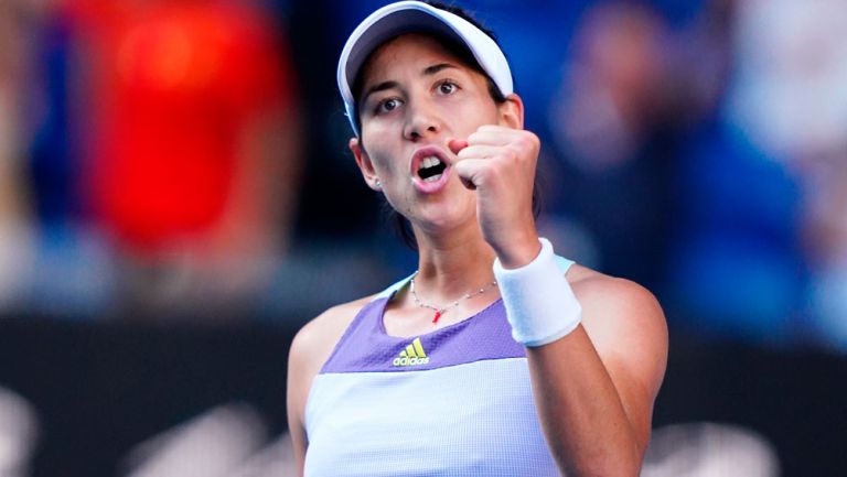 Garbiñe Muguruza celebra su victoria ante Simona Halep 