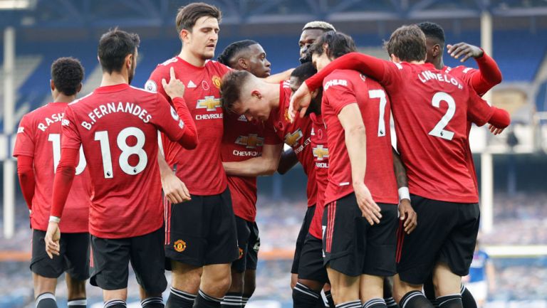 Jugadores del Manchester United festejan un gol 