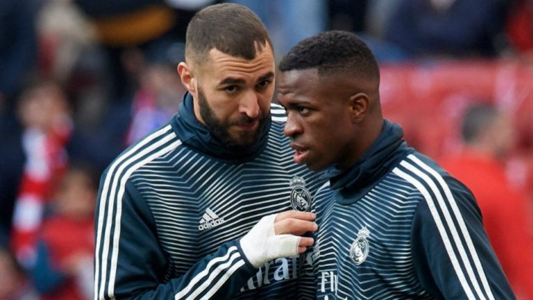 Vinicius y Benzema antes de un partido