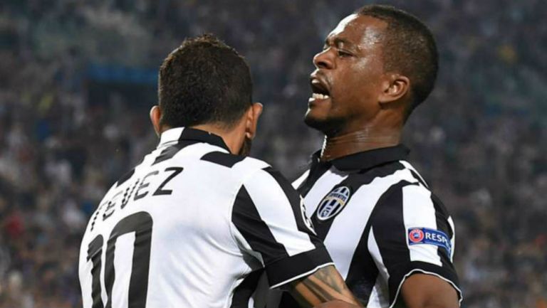 Evra y Tevez en festejo