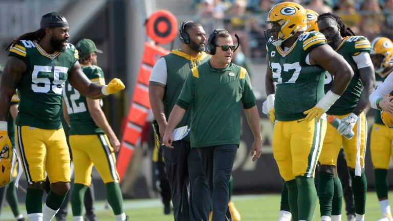 Los jugadores de Green Bay en el primer partido de la temporada