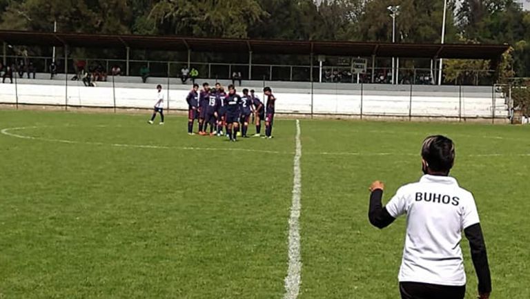 Jugadores de los Búhos durante un partido 