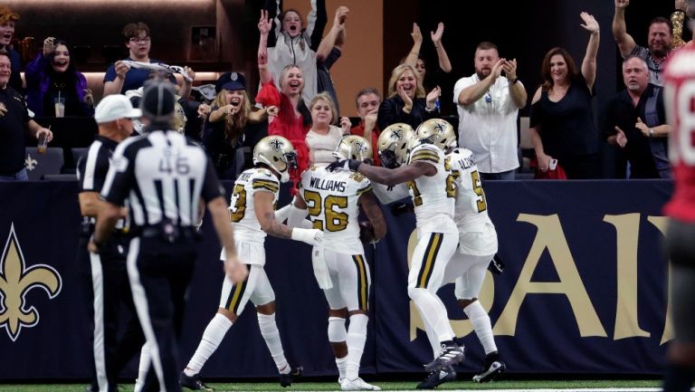 Jugadores de Saints celebrando