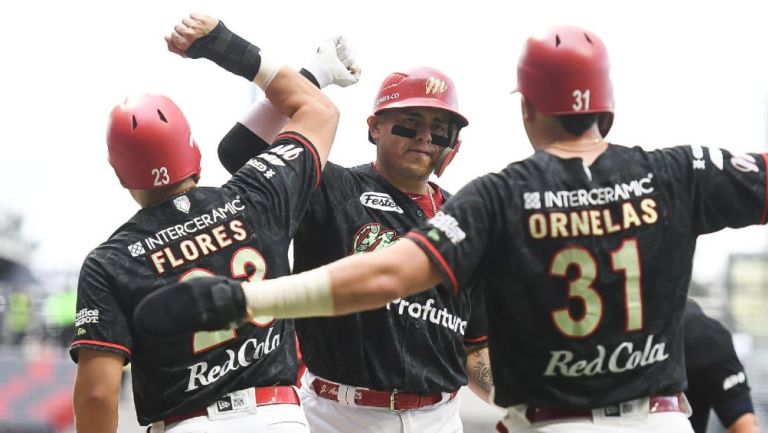 Jugadores de Diablos Rojos en festejo