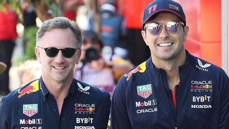 El directivo de Red Bull y el piloto mexicano 