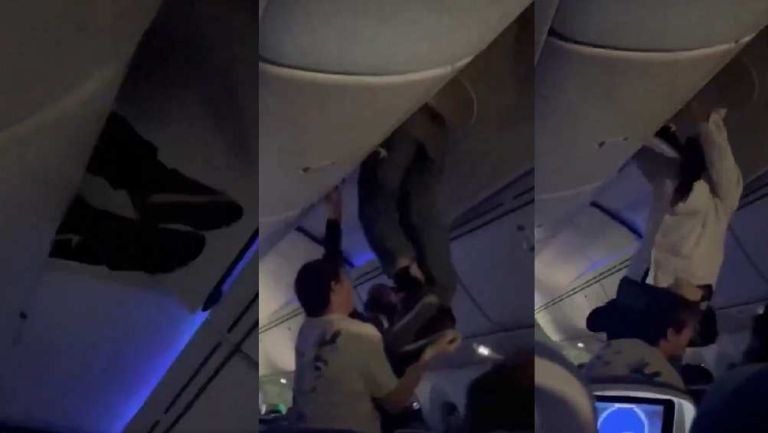Turbulencia provoca que pasajero quede atorado entre los maleteros y el techo del avión